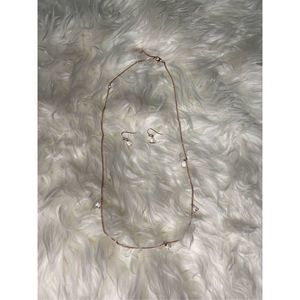 NWOT Rose gold chain necklace with white bell charms with matching earrings.